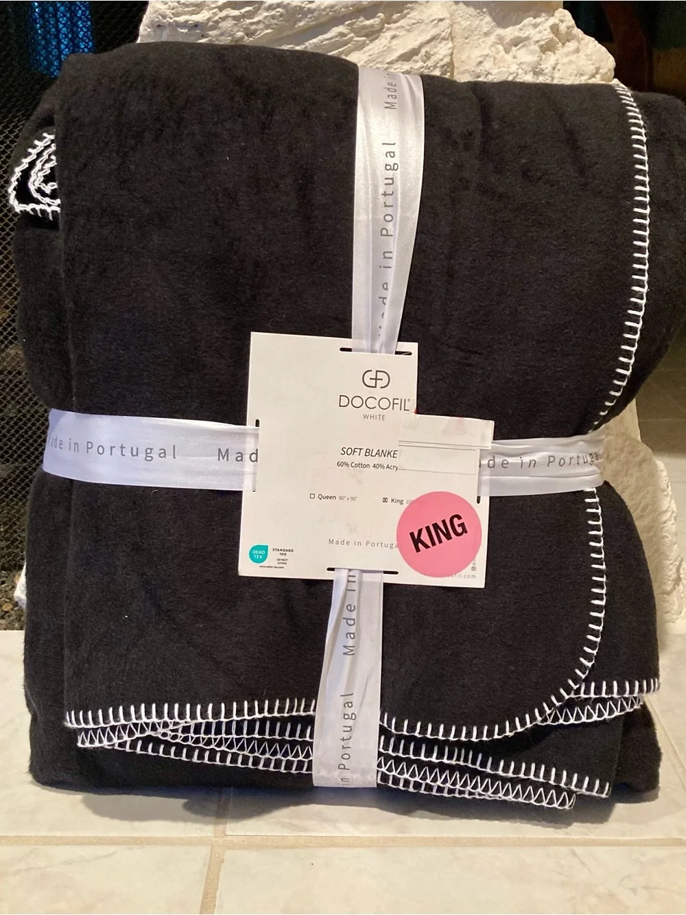 NWT “Docofil White” Soft King Blanket in Black with White Whipstitch Detail